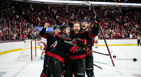 Carolina Hurricanes players celebrate during the Stanley Cup Final after taking a 3-2 series lead.