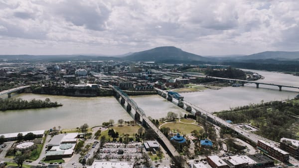 Downtown Chattanooga riverfront skyline and public gathering areas tied to Scenic City history and 2026 America 250 planning.